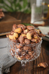 Roasted Salted Cashew Nuts in Crystal Bowl on Wooden Table - Healthy Snack Food Photography