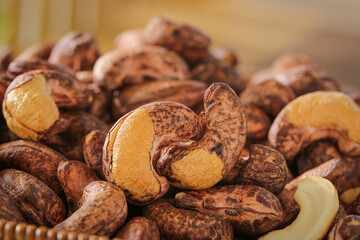 Roasted Vietnamese Cashews with Charcoal Coated Purple Skin and Golden Kernels
