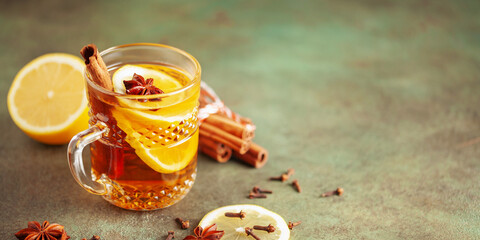 Spiced drink cocktail for New Year, Christmas, winter or autumn holidays. Hot Toddy.