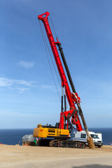 Drilling rig for leader drilling and pile installation