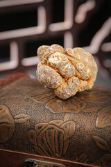 Wenshan Yunnan Panax Ginseng Roots Traditional Chinese Medicinal Herb on Carved Wood Surface