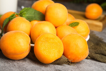 Fresh Organic Apricots from Yantai Shaanxi China - Ripe Orange Stone Fruit on Rustic Burlap Background