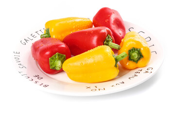 Fresh Red and Yellow Bell Peppers on White Plate - Colorful Vegetables with Water Droplets