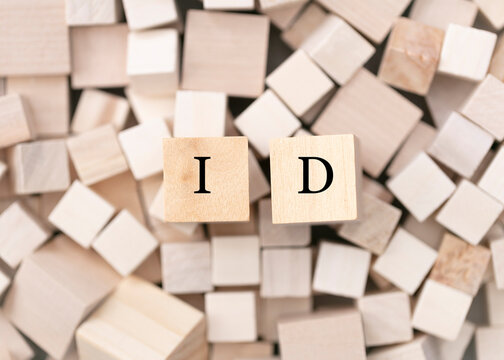 Identification concept. Abstract geometric wooden dice.  ID  icon. 