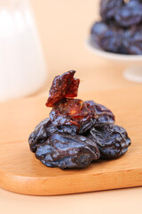 Traditional Japanese Umeboshi Dried Plums on Wooden Board - Healthy Preserved Fruit Display