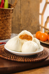 Freshly Baked Chinese Xiao Long Bao Steamed Dumplings on Rustic Kitchen Table