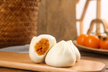 Fresh Chinese Steamed Buns with Meat Filling on Wooden Board - Traditional Asian Dumplings