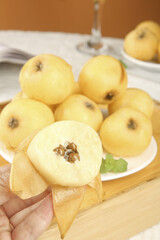 Fresh White-Fleshed Loquats at Suzhou Market Display with Cut Fruit Showing Interior