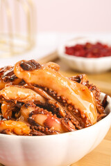 Spicy Marinated Cooked Squid Tentacles in Bowl - Asian Seafood Dish