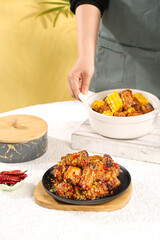 Spicy Grilled Pork Ribs with Garlic and Corn on Wooden Plate - Asian Cuisine