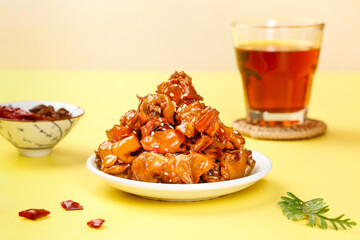 Spicy Glazed Fried Squid Seafood Dish with Tea Glass Asian Cuisine