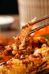 Chinese Rice Dumplings with Salted Egg Yolk and Meat - Traditional Asian Cuisine with Chopsticks