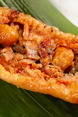 Guangxi Style Pork and Glutinous Rice Dumplings on Banana Leaf - Traditional Chinese Food