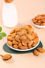 Dried Almonds and Mixed Nuts in Bowl with Almond Milk - Healthy Snacks and Protein Base Ingredients