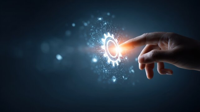 Touch of Innovation: A Hand Interacting with a Futuristic Gear Icon Surrounded by Glowing Particles and Light Effects