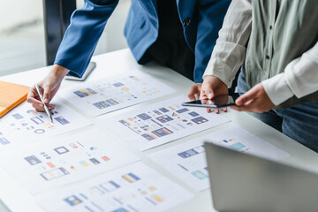 UX developer and UI designer in creative session with digital prototype tools