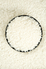 White Rice in Black Bowl on Rice Background - Food Photography
