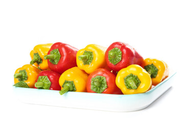 Fresh Colorful Red Yellow Bell Peppers on White Plate - Healthy Vegetable Display