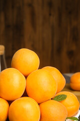 Fresh Apricot Fruits on Rustic Wood Background with Mint Leaves