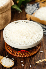 White Rice in Bowl on Rustic Wooden Table with Burlap Sack - Healthy Grain Food Photography