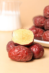 Xinjiang Ruoqiang Red Jujubes Dried Dates Cut Open Showing Fresh Interior Chinese Superfood