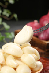 Fresh Shandong Multicloves Garlic Cloves on Fork with Vegetables - Healthy Cooking Ingredients