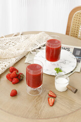 Fresh Strawberry Smoothie Drinks on Wooden Table with Berries - Summer Refreshment Beverage