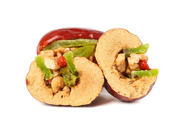 Red Bell Pepper Stuffed with Walnuts Dates and Kiwi Healthy Vegetarian Food Studio Shot