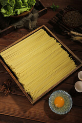 Traditional Buckwheat Noodles with Fresh Ingredients on Rustic Wooden Table - Asian Pasta Cooking...