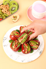 Stuffed Red Dates with Walnuts and Mint Leaves Healthy Snack Plate