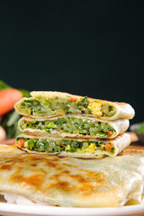 Handmade Egg Pancake Rolls with Vermicelli and Leek Filling - Asian Street Food Breakfast
