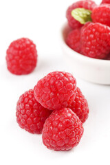 Fresh Red Raspberries in White Bowl on Clean Background