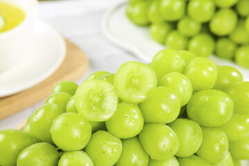Fresh Green Seedless Grapes Cut in Half Showing Juicy Interior - Healthy Fruit Snack