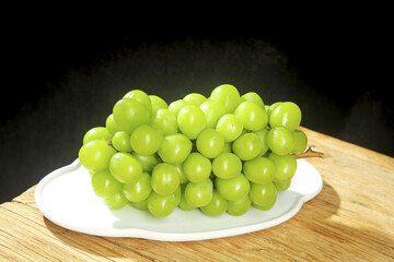 Fresh Green Seedless Grapes on White Plate - Healthy Organic Fruit Photography