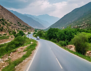 Naklejka premium Beautiful photography of a highway, with green mountains in Pakistan.