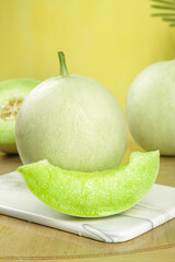 Fresh Honeydew Melon Slices on Cutting Board - Sweet Summer Fruit