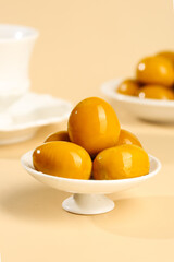 Delicious Golden Marinated Eggs in White Porcelain Dishes - Gourmet Food Photography