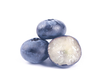 Fresh Big Blueberries with Cut Half Showing Juicy Interior on White Background