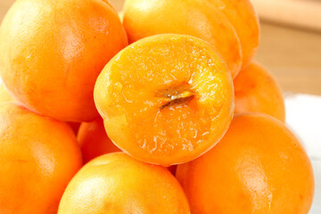 Fresh Apricots from Shandong Shaanxi China - Ripe Orange Stone Fruit Cut Half Showing Pit and Juicy Flesh