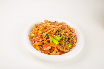 Scrambled Eggs with Sweet Potato Vermicelli Noodles and Vegetables Stir-Fry on White Plate