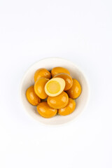 Marinated Quail Eggs in White Bowl - Gourmet Pickled Appetizer on Clean Background