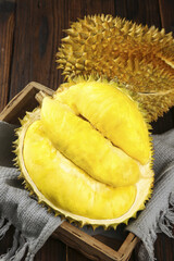 Fresh Golden Durian Fruit Flesh from Thailand on Rustic Wooden Background