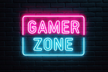 Obraz premium Neon sign reading GAMER ZONE in pink and blue against brick wall gamer zone glowing