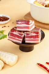 Smoked Salted Pork Belly Slices on Wooden Stand - Traditional Cured Meat with Fire Wood Flavor