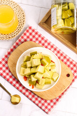 Pickled Mango Cubes from Guangxi - Sweet Sour Preserved Fruit Snack in Bowl and Jar