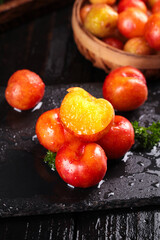 Fresh Crisp Plums on Slate - Colorful Stone Fruits Display