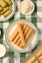 Crispy baked egg roll snacks, puffed food and fried in studio shot