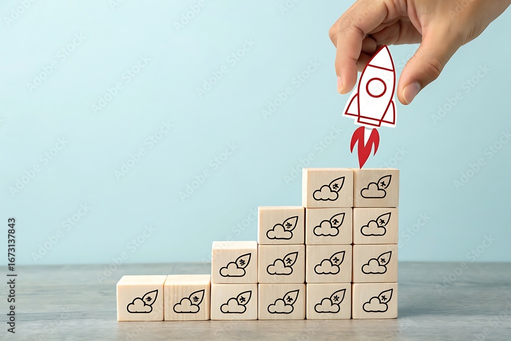 Aufkleber hand placing a rocket icon on a stack of wooden blocks with cloud and leaf icons launch startup