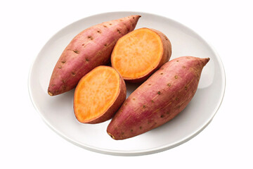 Sweet potatoes on white plate showing orange flesh cross-sections, displaying natural purple-red skin and nutritious bright orange interior when cut open.