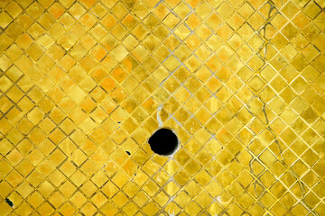 Golden Texture with Geometric Pattern and Central Hole